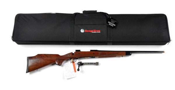 **CASED SAVAGE MODEL 10 BOLT ACTION RIFLE.        