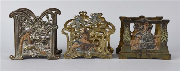 CAST IRON ASSORTED VICTORIAN LADY LETTER HOLDERS. 