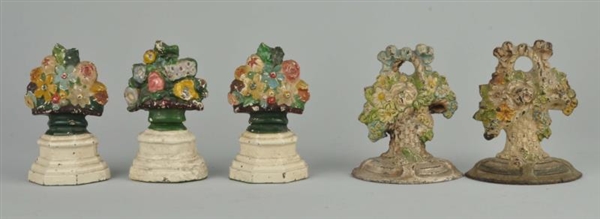 CAST IRON ASSORTED MIXED FLOWERS DOORSTOP.        