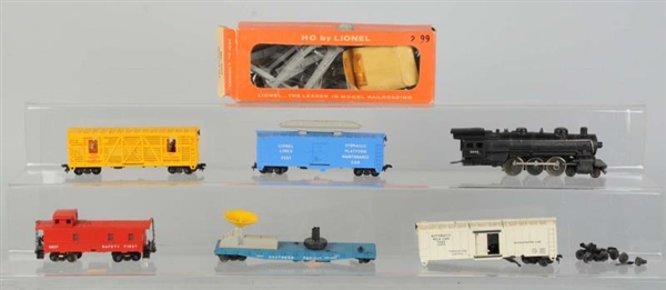 LOT OF 7: ASSORTED LIONEL HO TRAINS.              