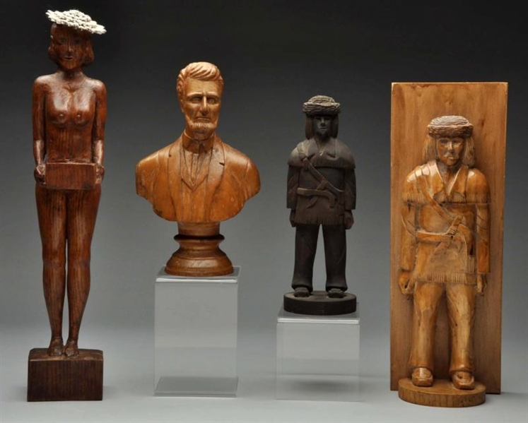 LOT OF 4: HAND CARVED WOODEN FIGURES.             