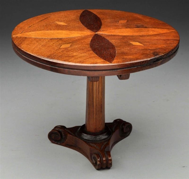 SMALL INLAID WOODEN TABLE.                        
