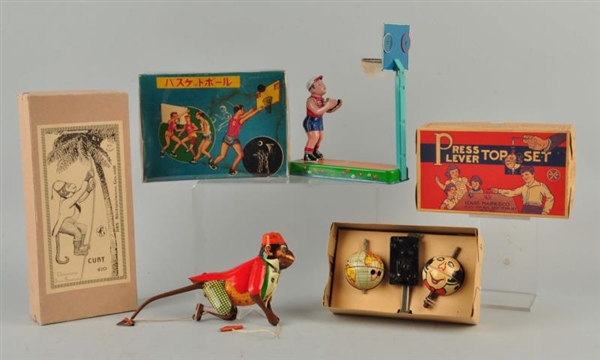 LOT OF 3: ASSORTED TIN TOYS WITH BOXES.           
