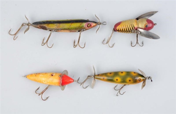 LOT OF 4: WOODEN HEDDON SURFACE BAITS.            