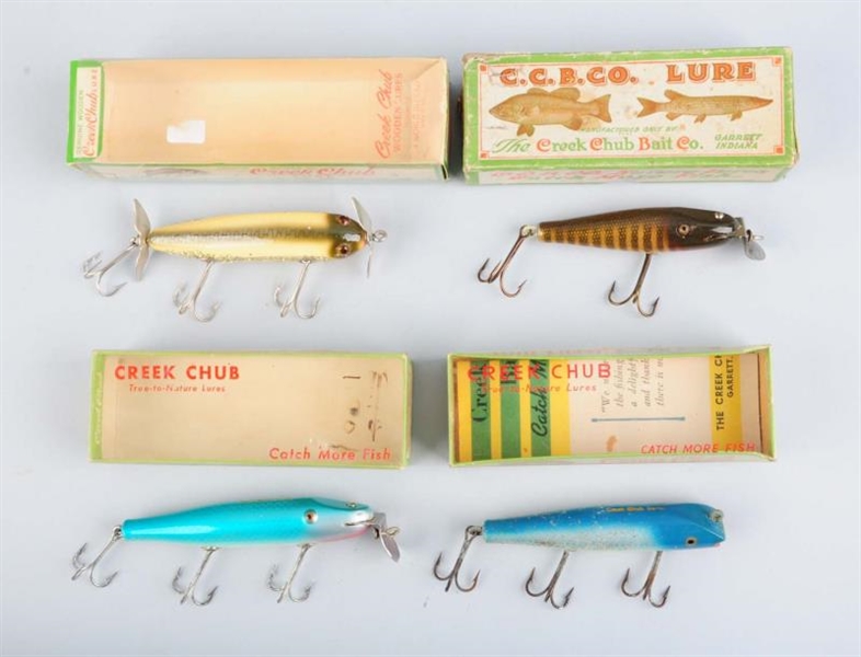 LOT OF 4:  CREEK CHUB FISHING LURE IN BOXES.      
