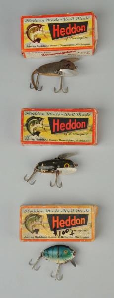LOT OF 3: HEDDON FLUTED WOBBLERS IN BOXES.        