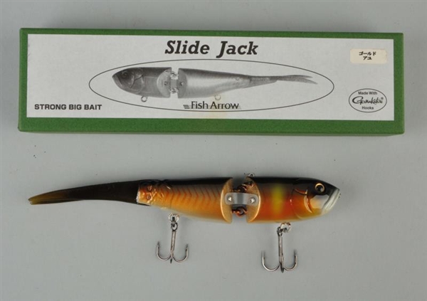 FISH ARROW SLIDE JACK IN A BOX.                   