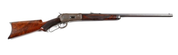 WINCHESTER MODEL 1886 DELUXE LEVER ACTION RIFLE.  
