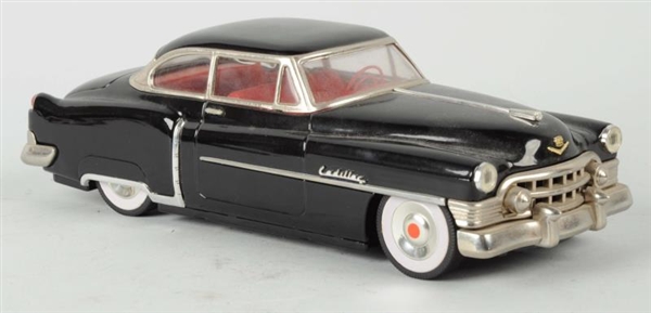 VINTAGE 50S FRICTION TOY CADILLAC.               
