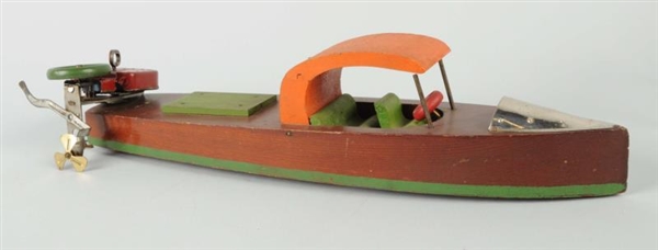 EARLY WIND-UP SPEED BOAT TOY.                     