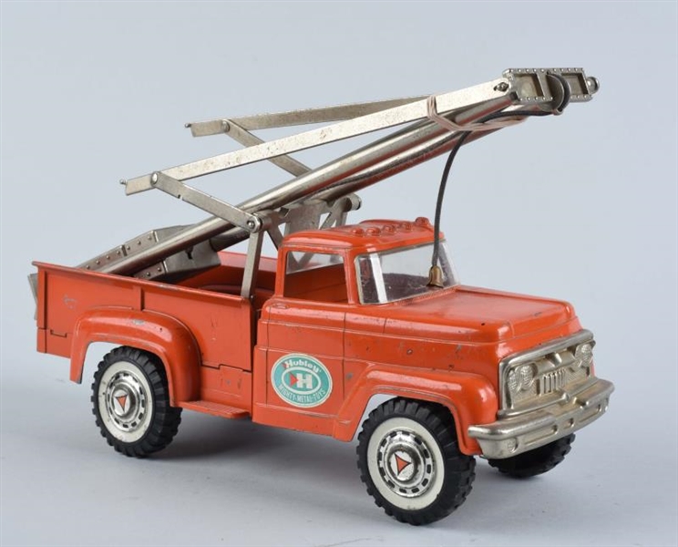 CAST METAL HUBLEY PILE DRIVER TRUCK TOY.          