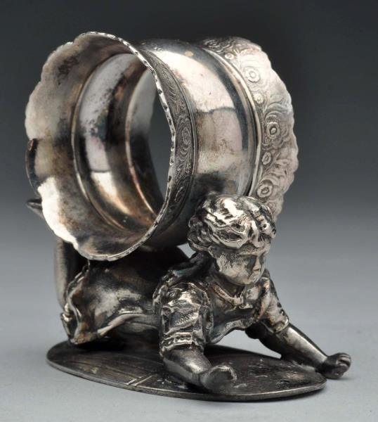 NAPKIN RING WITH CHILD.                           