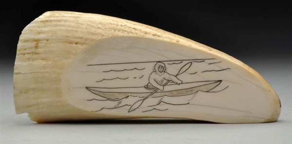 WHALE TOOTH SCRIMSHAW OF ESKIMO IN CANOE.         