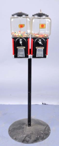1¢ TOPPER TWIN VENDING MACHINES ON STAND          