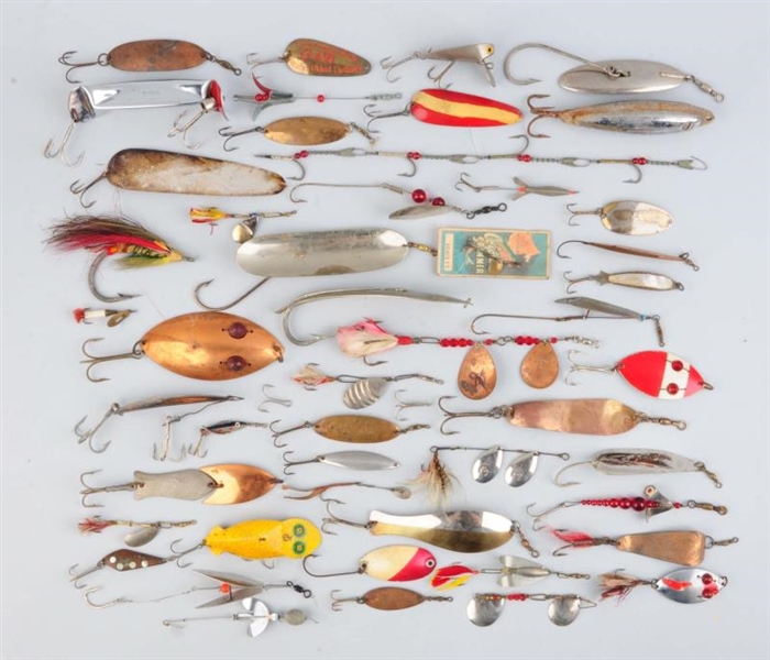 LOT OF ASSORTED FISHING LURES .                   