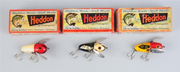 LOT OF 3:HEDDON BAITS IN BOXES.                   