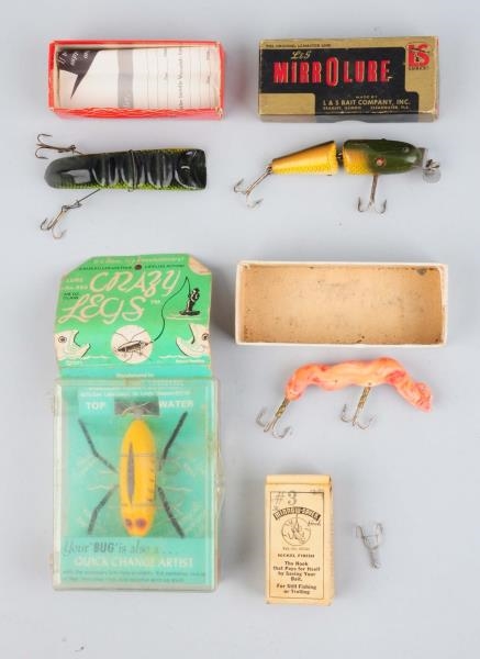 LOT OF 5: ASSORTED FISHING LURES IN BOXES.        