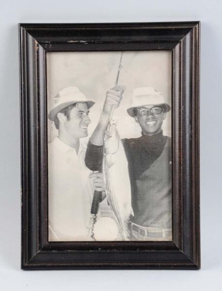 FRAMED AND DATED FISHING PICTURE ARTHUR ASHE.     