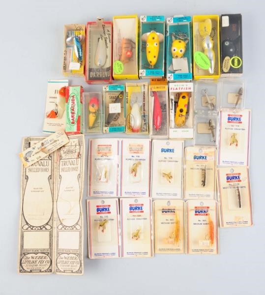 LARGE LOT OF ASSORTED FISHING LURES IN BOXES      