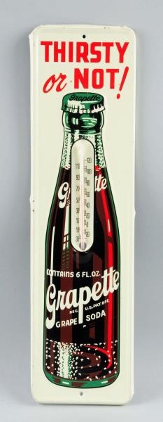 1940S-50S GRAPETTE EMBOSSED TIN THERMOMETER.      