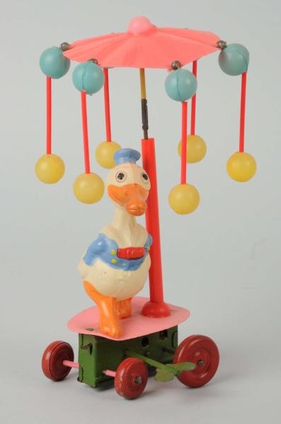 CELLULOID WIND-UP DONALD DUCK WHIRLIGIG TOY.      