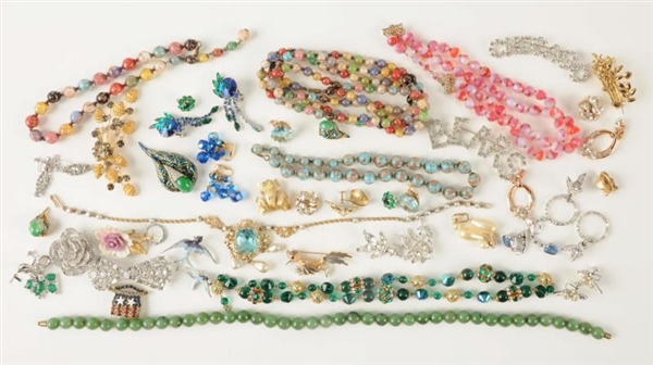 LOT OF ASSORTED COSTUME JEWELRY.                  