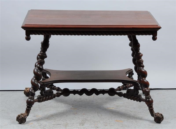 ORNATE WOODEN CLAW FOOT TABLE                     