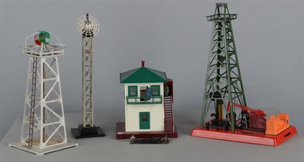 LOT OF 4: LIONEL TRAIN TOWERS AND BUILDINGS       