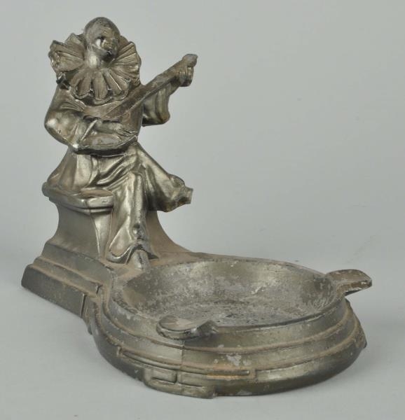 METAL ASHTRAY WITH FIGURAL CLOWN.                 