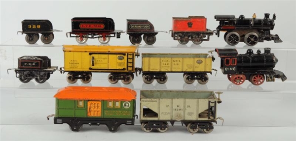 LOT OF ASSORTED TRAIN ENGINES & CARS.             