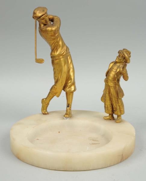 ASHTRAY WITH GOLFING FIGURES.                     