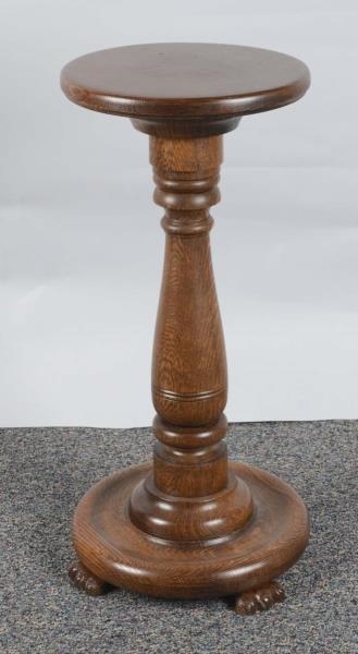 CARVED OAK ROUND TOP AND BOTTOM PEDESTAL STAND    