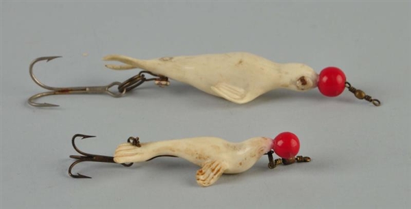 LOT OF 2:  WHITE SEAL FIGURAL LURES.              