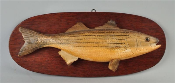CARVED STRIPED BASS.                              