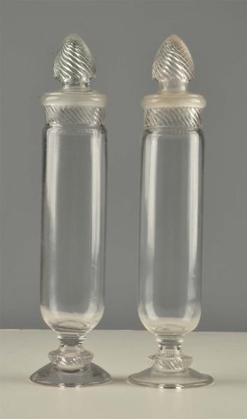 LOT OF 2: APOTHECARY GLASS JARS.                  