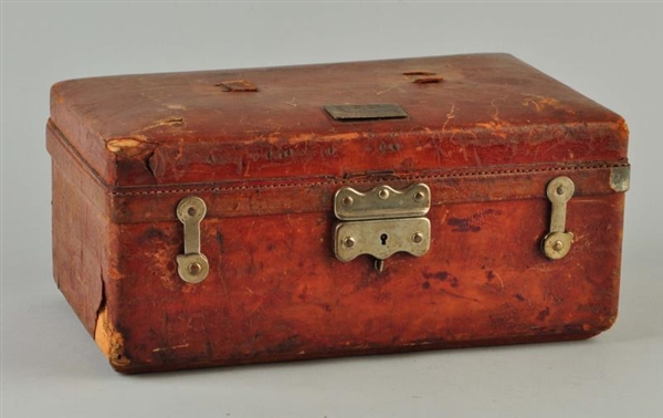 EARLY LEATHER TACKLE BOX.                         