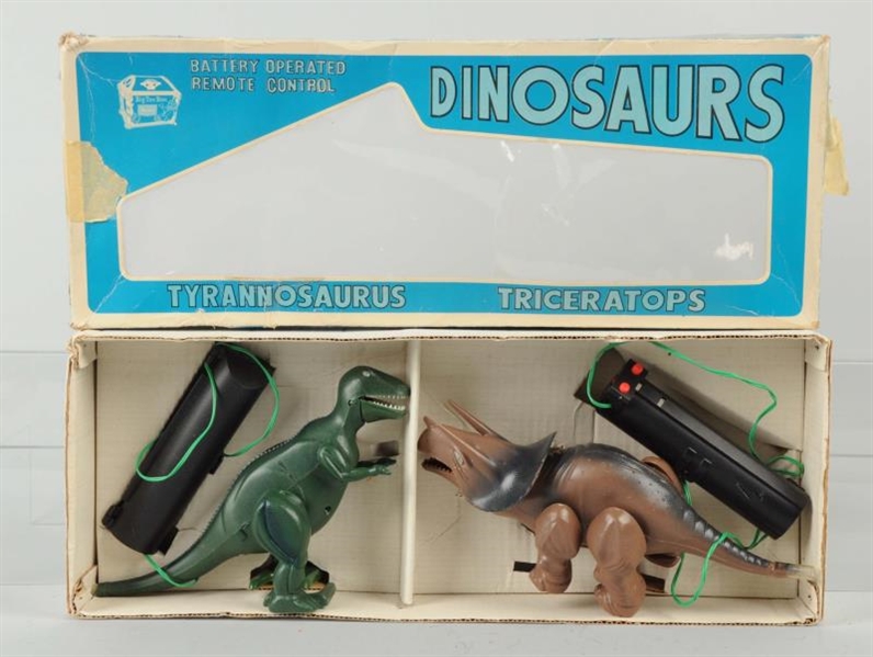 SEARS BATTERY OPERATED WALKING DINOSAURS IN BOX.  
