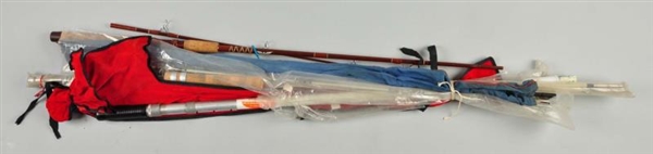 LOT OF 7:  GLASS FISHING RODS.                    