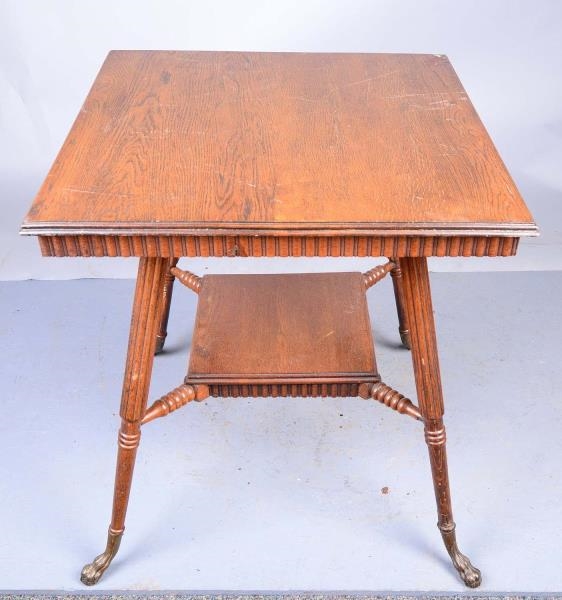 PARLOR TABLE WITH CLAW FEET                       