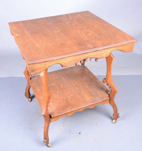 PARLOR TABLE WITH ROLLING CASTERS                 