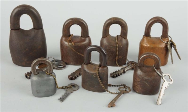 LOT OF 7: BARREL TYPE PADLOCKS WITH KEYS.         