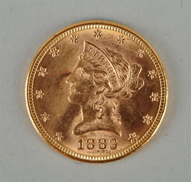 1883 $10 GOLD LIBERTY EAGLE.                      