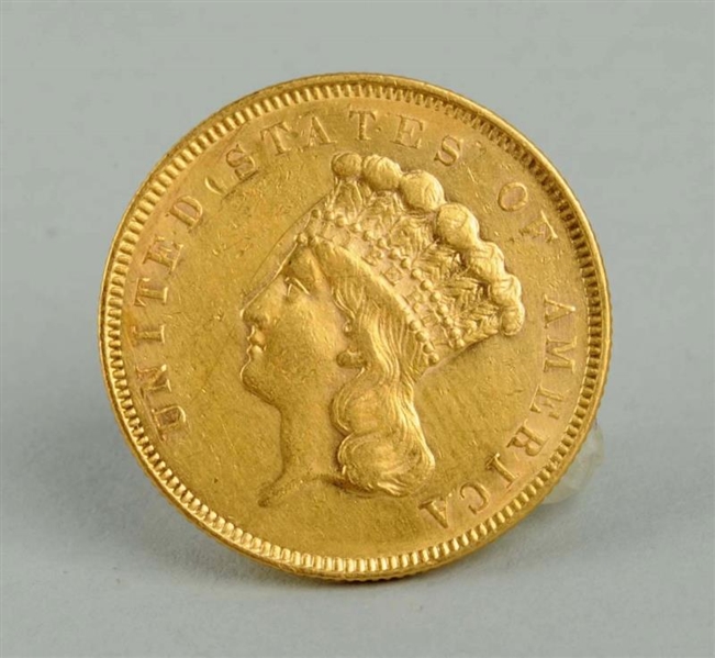 1855 $3.00 U.S. GOLD COIN IN CASE.                