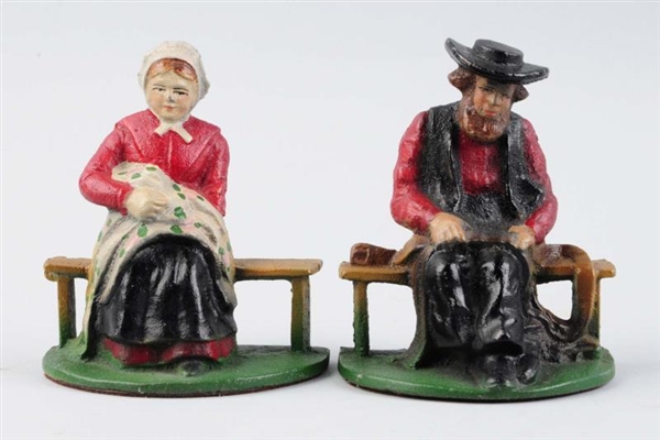 CAST IRON AMISH BOOKENDS.                         