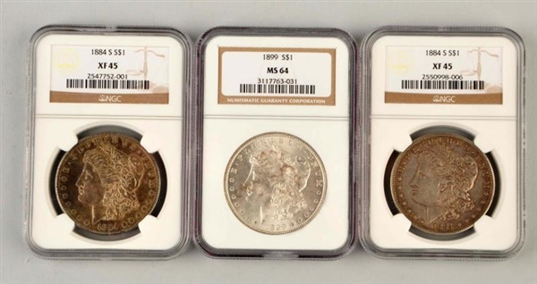 LOT OF 3: MORGAN SILVER COINS BY NGC.             