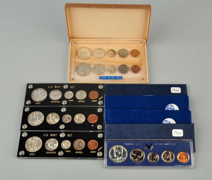 LOT OF 8: SETS OF COINS IN CASES.                 