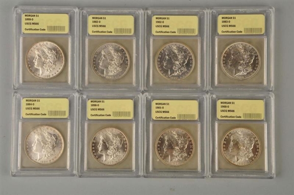 LOT OF 8: MORGAN SILVER DOLLARS IN CASES.         