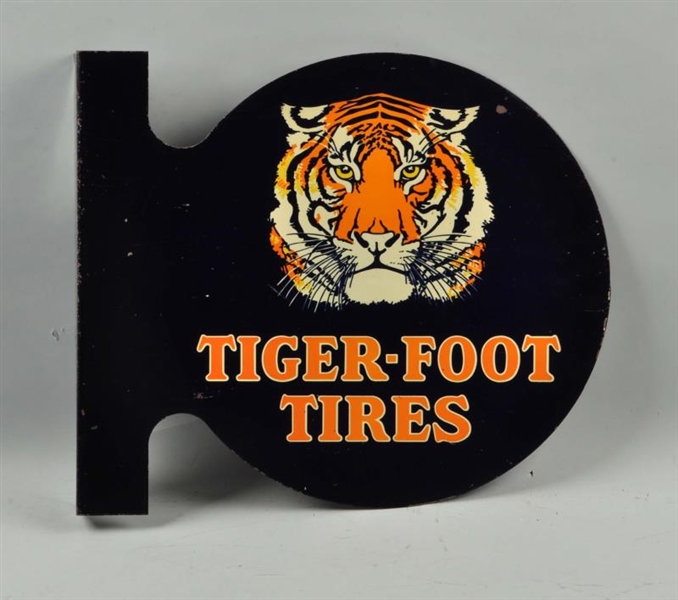 TIGER-FOOT TIRE WITH GREAT GRAPHICS SIGN.         