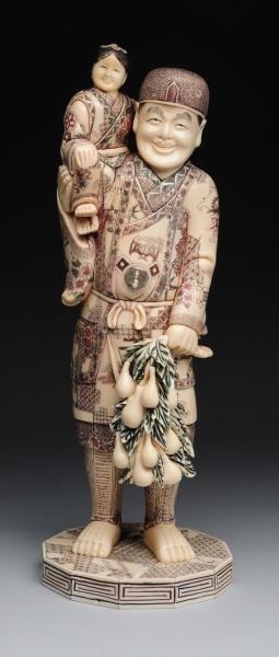 CHINESE COLORED IVORY FIGURE.                     