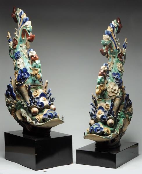 PAIR OF FISH SHAPED CHINESE POTTERY ROOF TILES.   